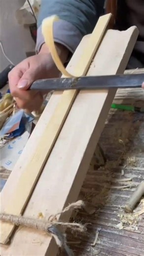 smoothing flat surface of thin wooden stick using manual handheld wood planer tool #shorts