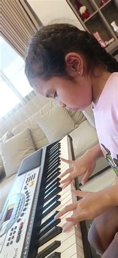 my student prcticing the basic fingering exercises"...