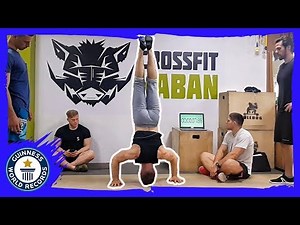 Most handstand push ups in one minute - Guinness World Records