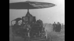MS early "flying machine" with umbrella-like propeller / VS man tries...