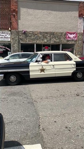 Mayberry Squad Patrol Car Driving Down Main Street in Mount Airy, NC