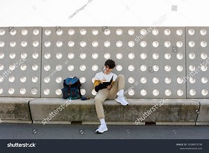 Young Male Writing Notes Notebook Sitting Stock Photo 2038873730 | Shutterstock
