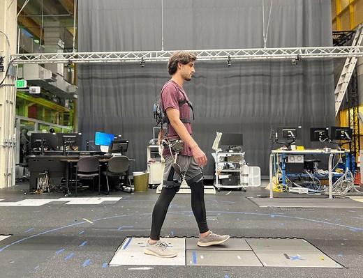 Estimating human joint moments unifies exoskeleton control, reducing user effort