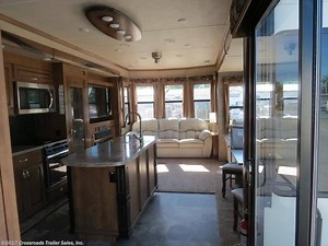 Live in luxury on the road in the 2018 Forest River Cedar Creek Cottage 40CCK. This Destination Trailer is perfect for families, couples and friends looking to spend extended periods of time at one vacation spot or campground. Loaded with residential features and amenities, the Cedar Creek Cottage will not disappoint. Save $27,345 and pay zero down when you finance at Crossroads Trailer Sales! Find more details and pictures here: http://www.crossroadstrailers.com/2018-forest-river-cedar-creek-co