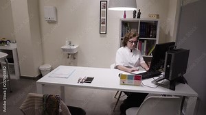 4k footage of acupuncturist manipulating needles inserted to a pacient during an acupuncture treatment in a private clinic