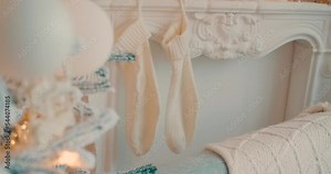 Christmas New Year interior decoration. Green tree decorated toys gifts present boxes flashing garland illuminated lamps. Fireplace Spirit Cozy Christmas atmosphere background. Shot Cinema Camera 2023 Stock Video