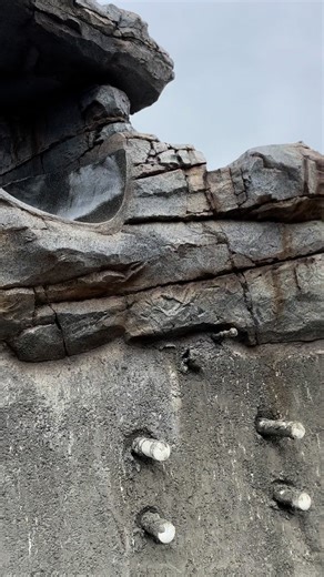 Matrix Concrete Artisans Inc Adding a rock feature to your swimming pool can enhance your outdoor space by providing a natural and visually appealing environment. Climbing areas and jumping rocks add an adventurous element, while caves and water slides offer exciting features for both kids and adults. #NatureMeetsInnovation #waterslidewonder #WaterfallWonder #natureinspired #BackyardGoals #artificialrock #customlandscaping #southerncaliforniadesign #ArtOfCreation #DreamPool | Matrix Concrete Art