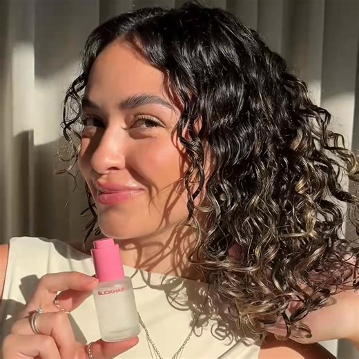 Curls gone wild? Meet the hair oil that actually works. NEW Anti-Frizz Hair Oil keeps curls bouncy, light, and frizz-free. | Slickhair