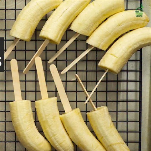 @healthyfoodhouseofficial on Instagram: "🍌 THE BEST FROZEN BANANAS 🍦 The ultimate healthy frozen snack — creamy, sweet, and naturally delicious! Perfect for summer days or a quick energy bite. ❄️✨ Ingredients: 10 Bananas, peeled 🍌 20 Popsicle Sticks 🍭 Check the video for full instructions 🎥 Follow 👉 @healthyfoodhouseofficial @healthyfoodhouseofficial @healthyfoodhouseofficial for more healthy & easy recipes 🌿"