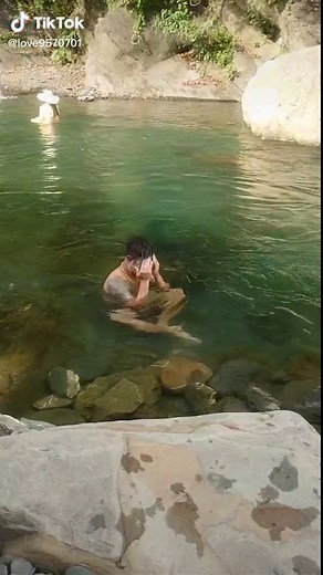 Natural Outdoor Bathing Experience in Clear Water