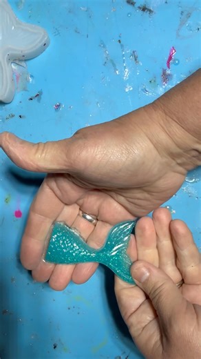 Pretty blue glitter mermaid tail. Little girls love these. Made with Let's Resin #gypsykreations #letsresin #resinreveal #ashlandohio #glitter #blue #mermaidtales | GypsyKreations