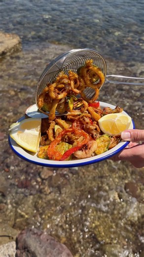 Skip the Greek takeout and make this instead! The link to pre-order my cookbook GREEK OUT is in my bio! If you pre-order now you’ll also receive my FREE 11 recipe booklet with never before seen RECIPES! Episode 2 of Summer in Greece is here! 🇬🇷 Today we're making crispy homemade calamari, finished with @diamondcrystal salt and served with tzatziki for dipping. This is one of those recipes that instantly transports me back to a Greek taverna, and it's straight from my cookbook GREEK OUT, availa