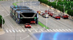 China built a giant traffic-straddling bus. We have questions.