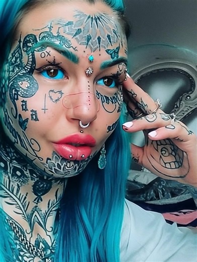 14K views · 55 reactions | “From blonde beauty to tattooed icon!”  Amber Luke’s extreme transformation — from self-doubt at 14 to over 130 tattoos, fangs, and inked eyes — has the internet buzzing 勞 Is this rebellion or raw self-expression? See her dramatic evolution in the comments below  | Interesting to know | Facebook