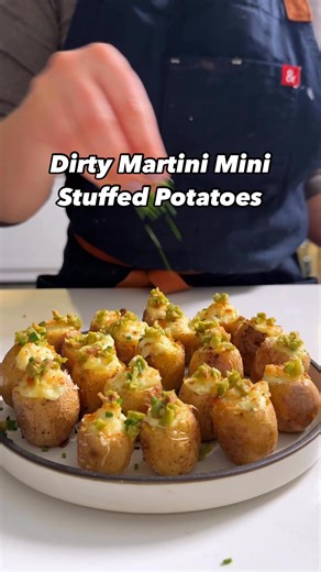 A Dirty Martini cocktail meets a bite-sized party appetizer in these stuffed potatoes 🍸🥔. Get the recipe for these Dirty Martini Dip Mini Stuffed Potatoes in the comments! 🥔: Melissa Gray, 🎥: Chloe Gebacz and Andrew Barksdale | Food & Wine