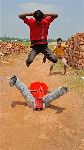 He picked up the wheel of his small bike between his legs.73