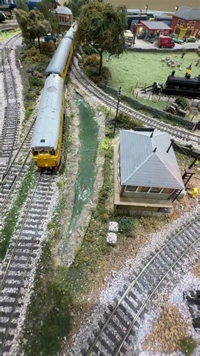 Class 31 network rail passes the signal boxes.