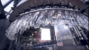 Modern clean Production line of carbonated drinks. Empty plastic bottles in automared washing line. HD. Stock Video