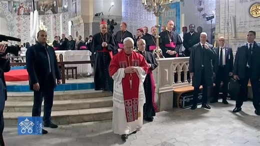 Pope Leo XIV lights a candle and prays before an icon of the 19 Martyrs of Algeria, slain by Islamic terrorists between 1994 and 1996 during the Algerian Civil War.