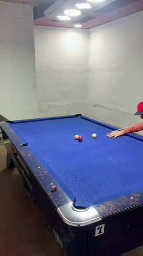 Mastering Pool Techniques on a Blue Table