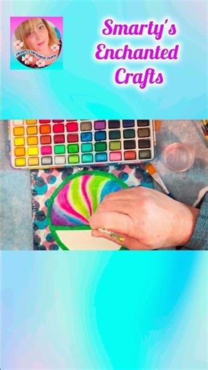 Circular watercolour painting of the bright northern lights