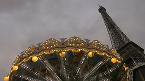 Download Vintage carousel and Eiffel Tower in the evening