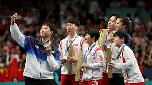 North and South Korean athletes share an Olympic podium — and take a selfie