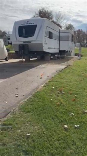 This 2026 Coachmen Freedom Express 274RKS set up on a seasonal site started with a great base & by adding treated planks under tires, shims between tires, study block bases that are shimmed to the frame this unit will feel like it's sitting on a house foundation. #likeapro #experience #decadesofdedication #HappyCampers #countryrvllc #CoachmenRV | Country RV LLC