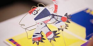 Handling a puppet book · V&A