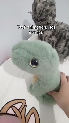 animated test version of cat and dinosaur puppet