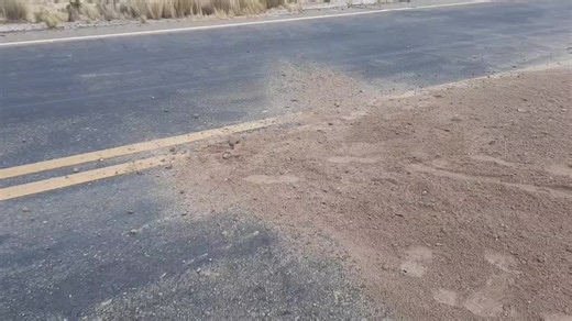 Exploring a Dusty Deserted Roadscape