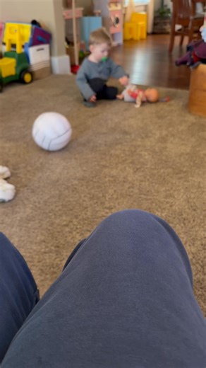 Teaching his baby to kick the ball | Tammy Jackson