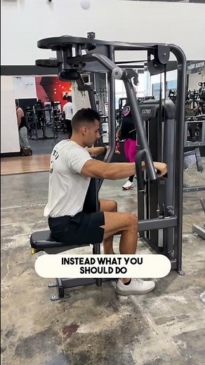 How to Properly Use The Pec Deck Rear Delt Fly Machine With Good Form (Exercise Demonstration)