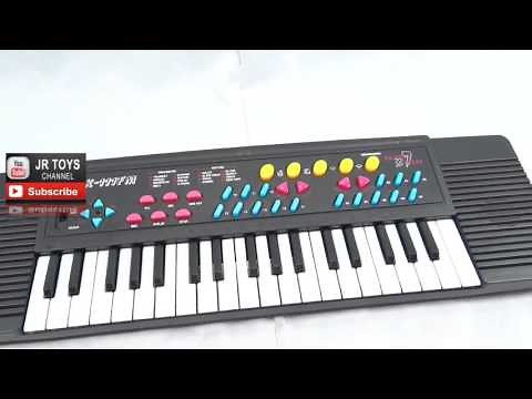 Piano keyboard toy with fm radio for children LEARNS MUSIC tones, rhythms and 5 songs