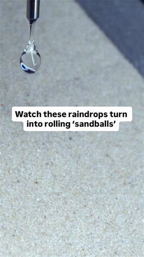 Science Magazine on Instagram: "When a raindrop hits the ground, it explodes like a tiny bomb, carving out a tiny crater that sends soil and sand grains flying. Now, scientists report a previously unknown—and even more erosive—behavior. Under certain conditions, raindrops can bounce and then roll down a slope, picking up sand as they go. The sand-covered balls transport up to 100 times more sediment downhill than drops that don’t roll, a fact that could help make more realistic computer models o