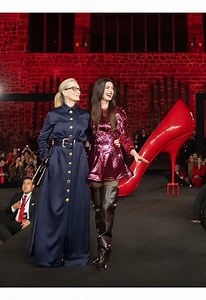 Anne Hathaway Wears Stella McCartney Boots