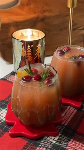 Primark on Instagram: "Your new favourite festive mocktail starts right here @cosimafawcett 🎅 #Primark Recipe ⤵️ Ingredients: For the ice: 1 Small Orange 1 Sprig of Rosemary Handful of Cranberries For the mocktail: 90 ml Cranberry Juice 60 ml Orange Juice Soda Water/Lemonade to top Method: 1. Thinly slice the orange into rounds then into quarters. Place an orange slice, cranberries and a sprig of rosemary into your festive ice cube tray. Fill with water and freeze. 2. Once frozen place 2-3 ice