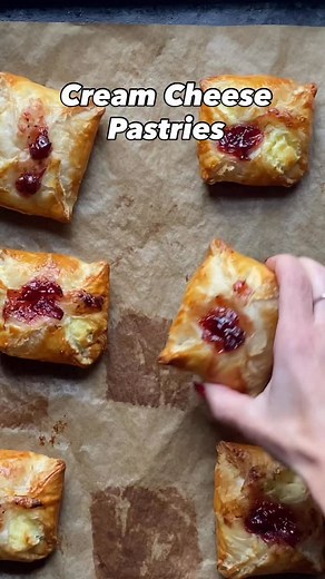 2.4K views · 86 reactions | Easy, sweet and delicious puff pastry filled with cream cheese and cranberry sauce. . Comment recipe and I’ll DM you a link. . https://www.onesarcasticbaker.com/cream-cheese-breakfast-pastries/ . . . #baking #homebaker #pastry #foodie #bakinglove #thanksgiving #puffpastry #creamcheese | One Sarcastic Baker | Facebook