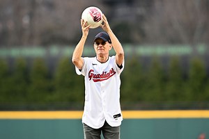 ICYMI: Hollywood star Tom Hanks throws the ceremonial first pitch for the Cleveland Guardians, accompanied by 'Wilson'