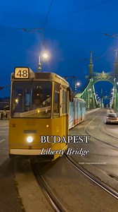 Budapest’s iconic tram glides through the night, its warm lights reflecting on the Danube as it passes by glowing landmarks and the heartbeat of the city 🚃🌆🏰😍🌊🇭🇺 📸 Credit: megustamariscos [IG] | Budapest Bliss