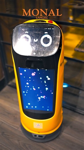 Experience the future of fine dining 🤖✨ At Monal Lahore, our robots serve you with perfection, blending innovation and elegance on every table." #MonalLahore #robotservice #FineDiningExperience #LuxuryWithTech #FutureOfDining #MonalExperience | The Monal Lahore