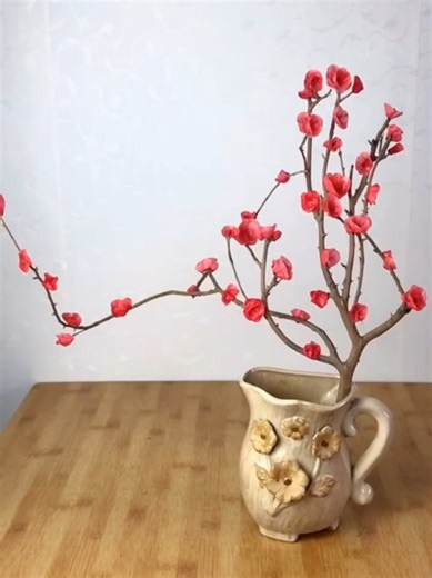 This artist crafts detailed flowers from wax, solely using their hands and cold water. Through meticulous molding and shaping, they transform wax into delicate blossoms, each reflecting their expertise. When immersed in cold water, the wax hardens, preserving the flowers' elegance indefinitely. These botanical creations, captured in time, highlight art's power to immortalize nature's ephemeral beauty. Artist: Xiannu1208xiannv & 881754330 on Douyin #art #diy #flowers #wax