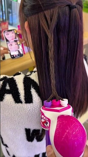 This tool is used to form neat centipede braid patterns, making the weaving look tidy and unique