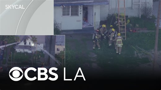 Los Angeles firefighter falls off ladder while battling house fire in Arlington Heights