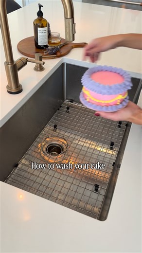 Vintage Cakes | Guelph Cakes on Instagram: "This feels illegal, but it works 😅 Yes - I’m washing a cake. And yes, you can wash a cake after piping practice on a dummy cake too… but I don’t usually use dummies. When I want to experiment, I bake a real cake and give it away. Way more fun that way 🤍 Ps. These pretty colours? Always @colour.mill Use April10 at checkout to save 💖 P.p.s. Smooth buttercream recipe linked in bio 💖"