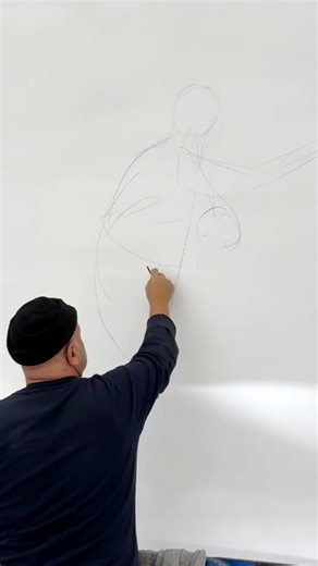 Writing the Light on Instagram: "UP IN THE CLOUDS | George Kordis writes the Light, this time with charcoal in hand as his lines shape the design for Three Hierarchs Church in Budapest, Hungary. SACRED SPACE: The new CHURCH WALL-PAINTING program working with master artist and iconographer @gkordis is set to launch in 2026 as the only program of its kind training the next generation of church wall painters. All info in our website. Countdown to Athens residencies 2026 is underway… from Drawing & 