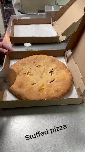 Delicious Stuffed Pizza at Big Chef's Pizza in Norwood