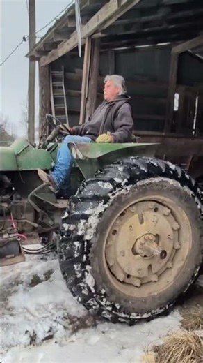 Dad parking the John Deere tractor under icicle #ice #icicles