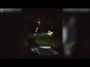 Watch: Two men, one dog rescued from sinking boat on the North Shore