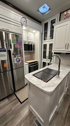This dishwasher sink is one of our favorite RV upgrades! #RVUpgrades #RVHacks #SinkDishwasher #RVLife | The Everywhere Family